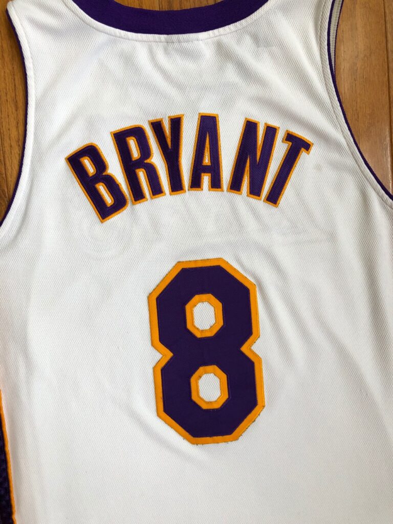 Los Angeles Lakers: Kobe Bryant 2001/2002 Yellow Champion Jersey